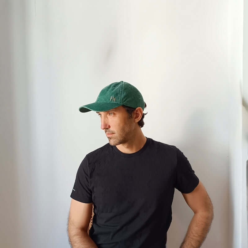 Side view of model wearing the Green Cotton Dad Hat by Free Heads. XL Cap for Large Heads.